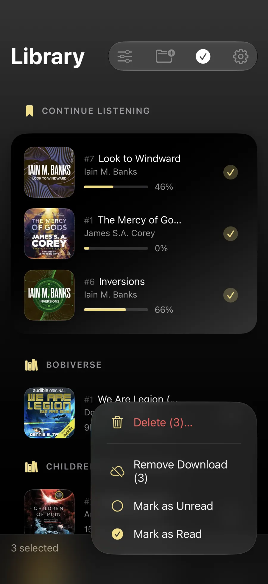 Three books selected with a menu of batch actions